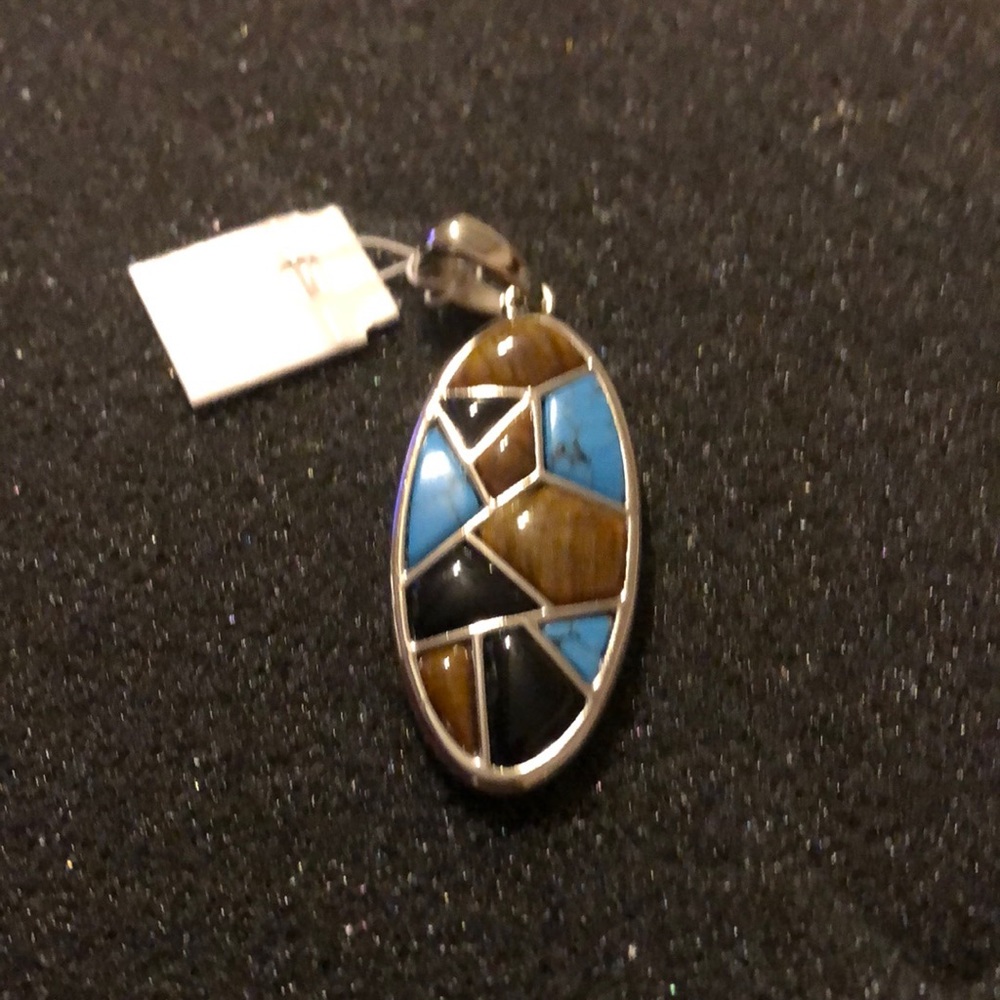 Blue/brown/silver charm.